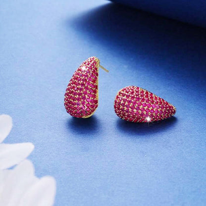 Elegant Luxurious Gold Color teardrop shaped Stud earring with sparkling cubic zirconia